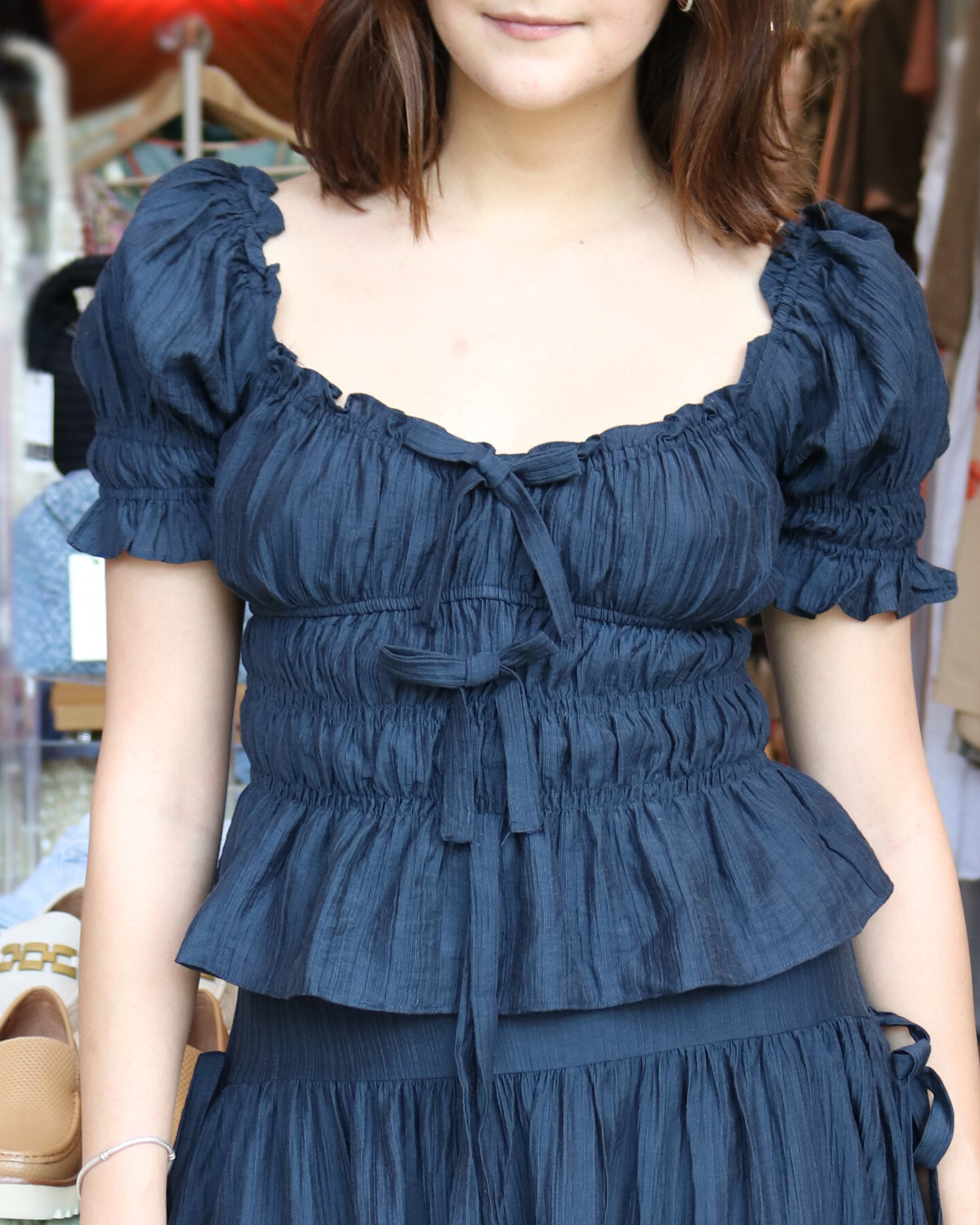 TOP CON CINTAS DELANTERAS