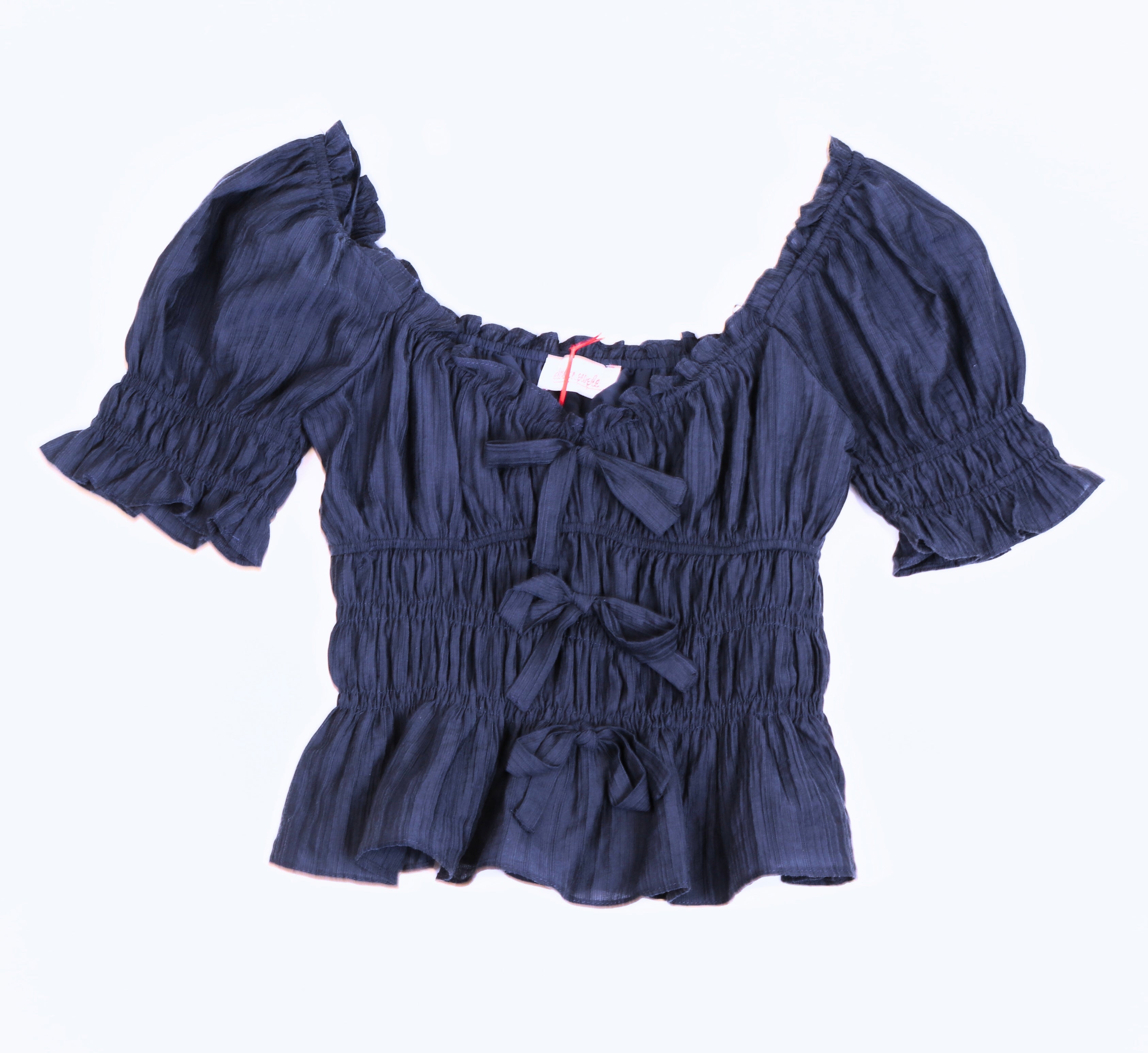 TOP CON CINTAS DELANTERAS