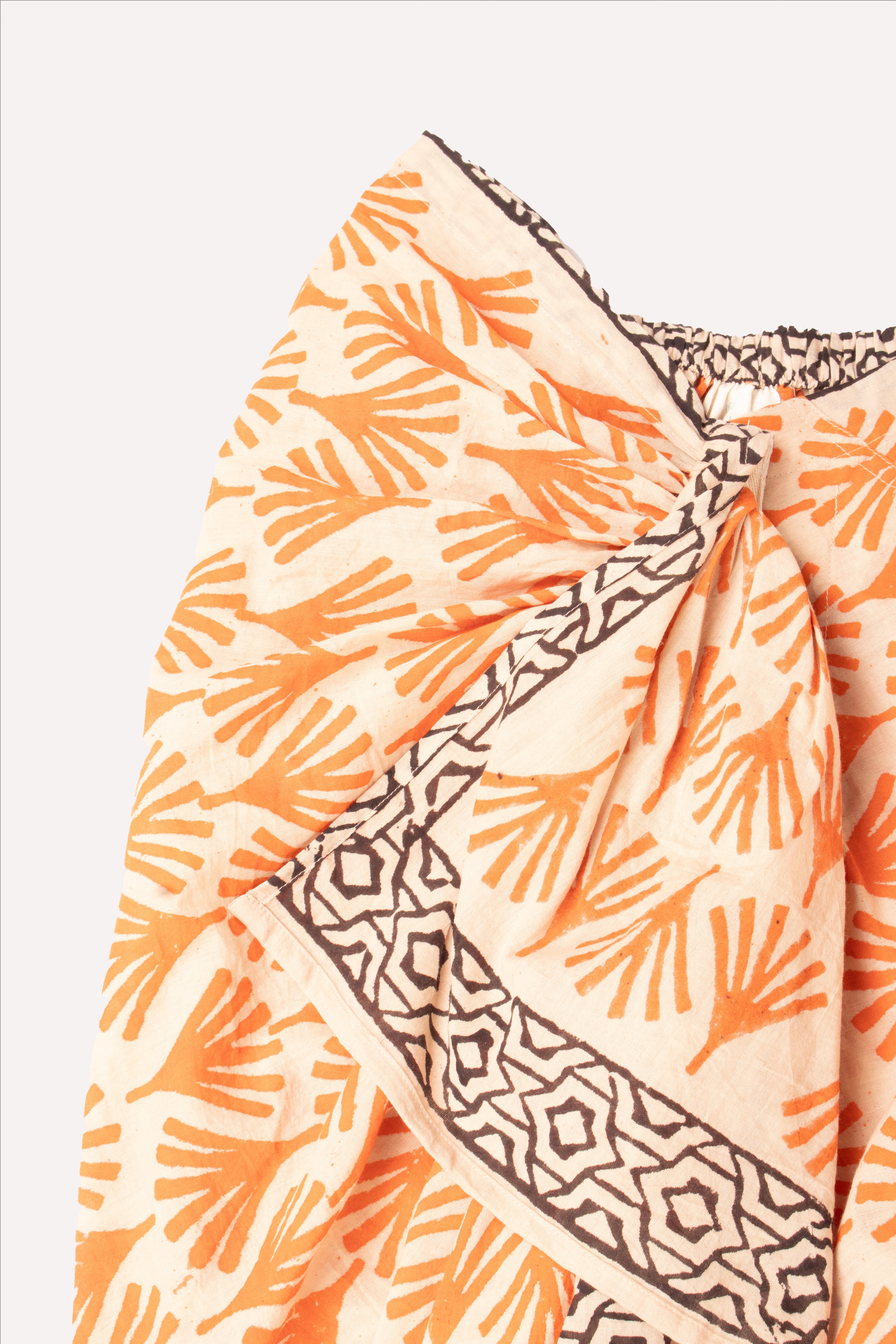 GUADALUPE INES PAREO ORANGE SKIRT