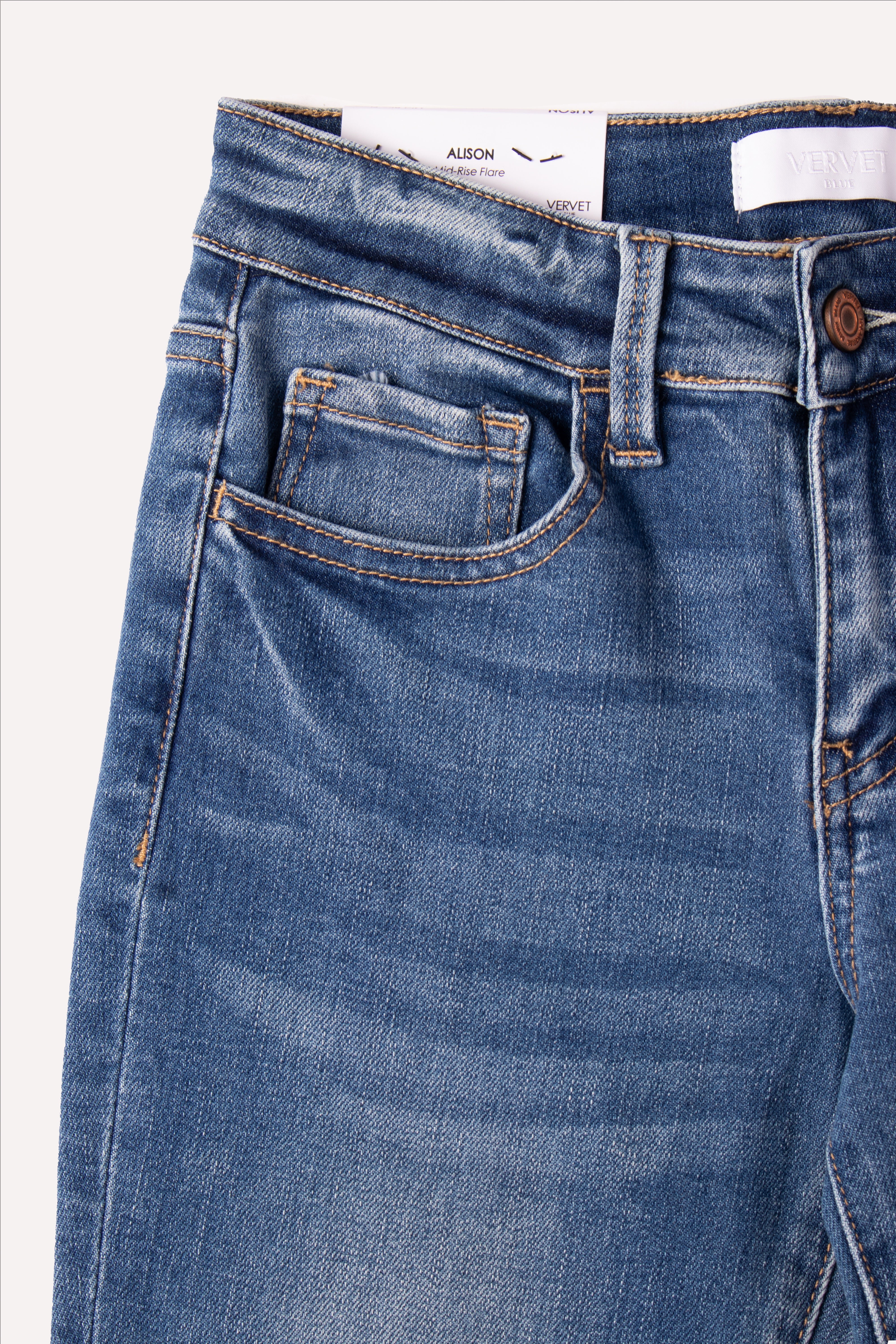 JEANS MID RISE MINI FLARE W RAW HEM VERVET